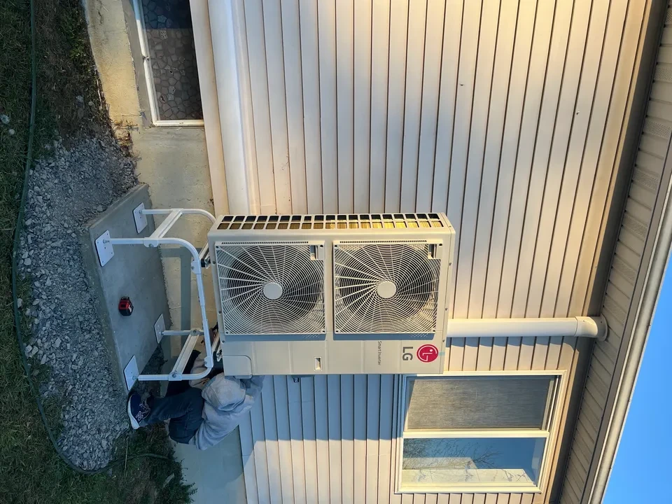 LG unit being installed at dusk