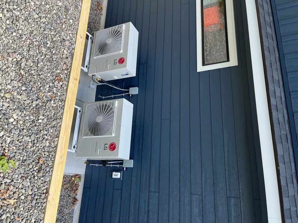 Two LG units on dark blue house